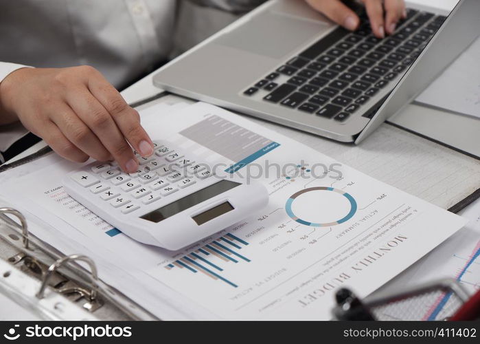 young female professional working in bright office