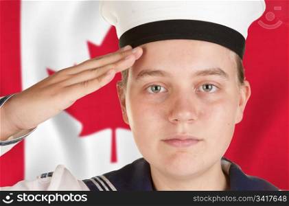 young female sailor saluting in front of canadian flag
