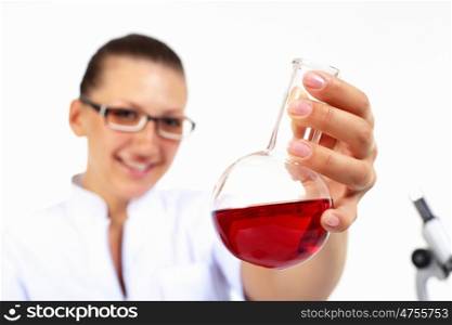 Young female scientist in a chemistry laboratory