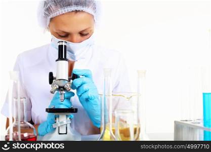 Young female scientist in a chemistry laboratory