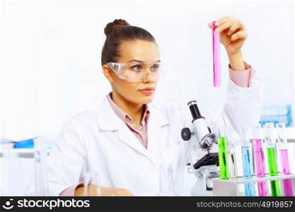Young female scientist working with liquids in laboratory. 3nKjvNQ1MmG/sef/XhRhgtf6zvoG2RdnppvEyNJf470PnUmRVQ3xtpljLCLkdIAs8vKI+PCbIoc2Mt8sK27byFPVVy6VG2Yv9CZ/XbXAtNU3HwFH4OCIdDukF63X2n7gJrbzb3A9Uc2ibUyhQdNylEBBsrMwsKeEe0TIfNKjPX1bYpVxdSnV1UtUK5/oegsIX72gYyy8z2eevaT+qt5ZRI8kEAgXiJOrwgEc7p3J+kIOQuEWu9qLwj190J8609AlQOQb95NMkCFwjwXEcQkoT4OL8oOeliJloUsYY6xDcFmC0+Y2WSiQvcA0XCgLGIkP