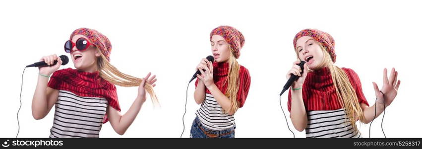 Young female singer with mic on white