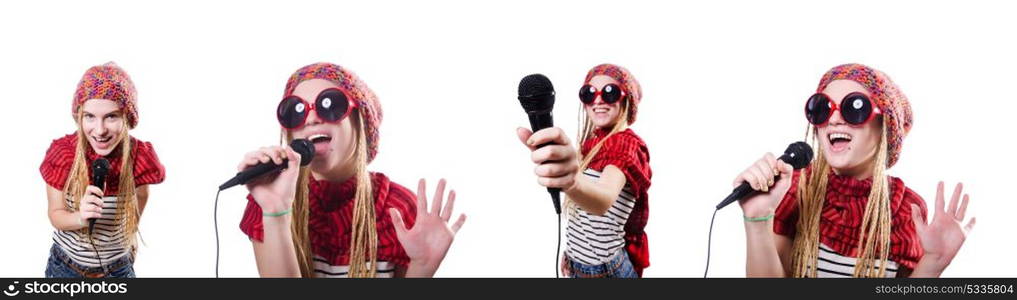 Young female singer with mic on white