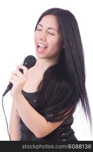 Young female singer with mic on white