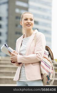 Young female student at college campus