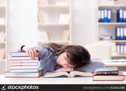 Young female student in educational concept