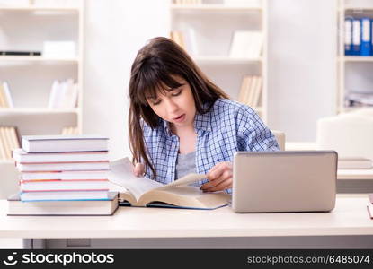 Young female student in educational concept