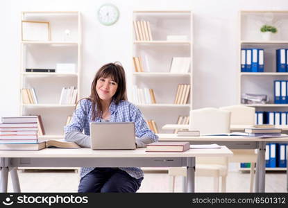 Young female student in educational concept