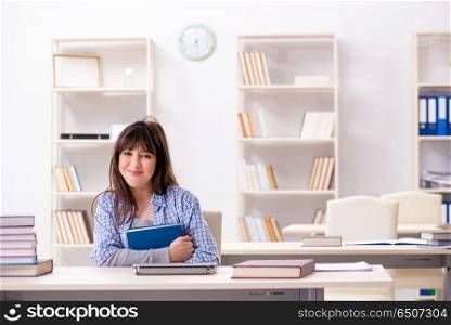 Young female student in educational concept