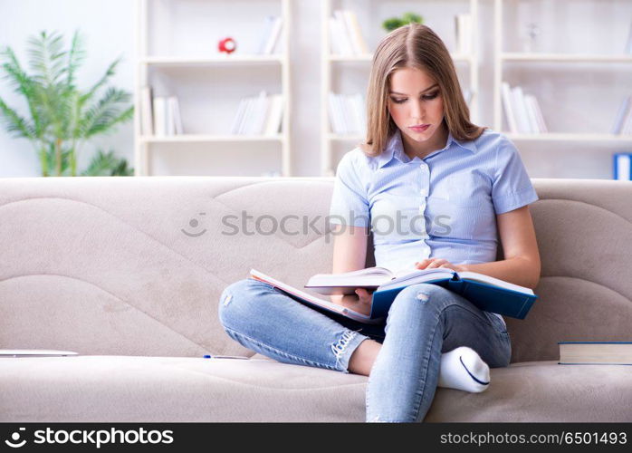 Young female student preparing for college exams