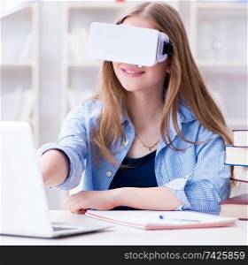 Young female student preparing for exams with VR glasses