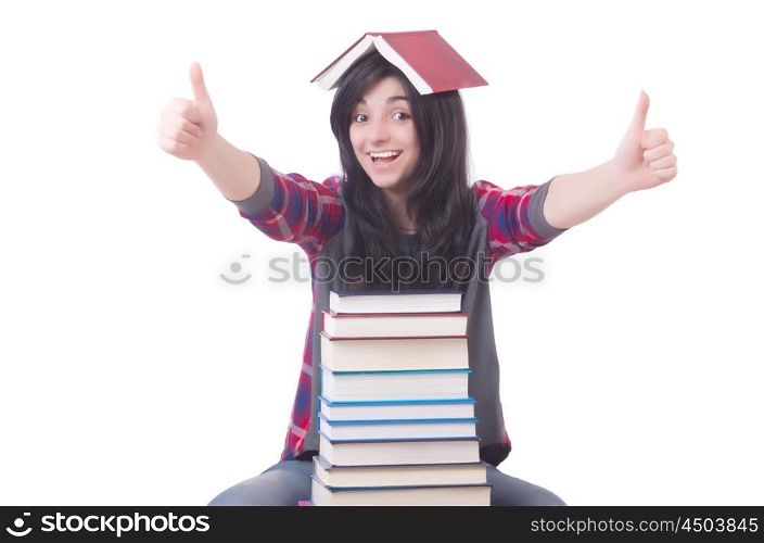 Young female student with books on white