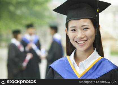 Young Female University Graduate, Close- Up Portrait