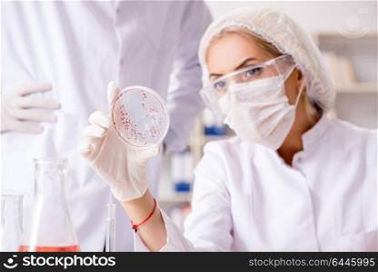 Young female woman doctor in hospital clinic lab