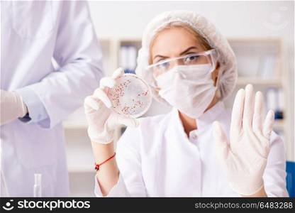 Young female woman doctor in hospital clinic lab