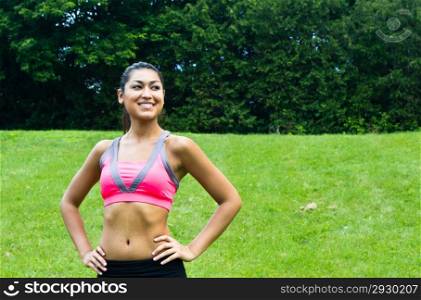 Young fit woman in the park