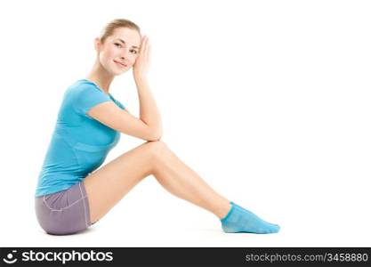 young fitness girl, posing over white, studio shot