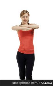 young fitness woman exercising. young fitness woman exercising with crossed arms on white background