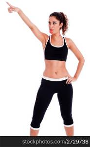 Young fitness woman pointing up the right corner on isolated white background