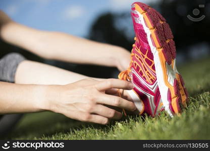 Young fitness woman running, Training and healthy lifestyle. Runner feet running on road closeup on shoe