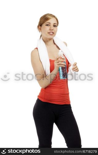 young fitness woman with a bottle of water. young sporty fitness woman with a bottle of water and a white towel on white background