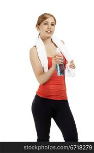 young fitness woman with a bottle of water. young sporty fitness woman with a bottle of water and a white towel on white background
