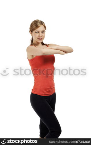 young fitness woman with folded arms. young fitness woman exercising with folded arms on white background