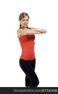 young fitness woman with folded arms. young fitness woman exercising with folded arms on white background