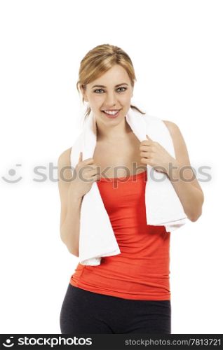 young fitness woman. young sporty fitness woman with a towel on white background