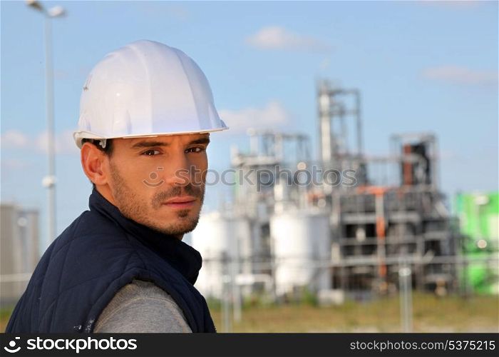 young foreman posing in construction site