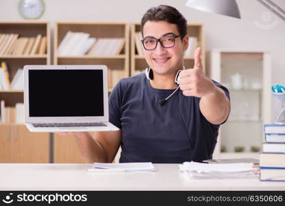 Young freelance worked working on computer