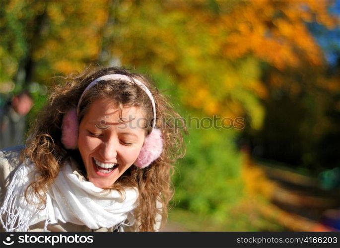 young fresh smiling woman with headpieces in autumn