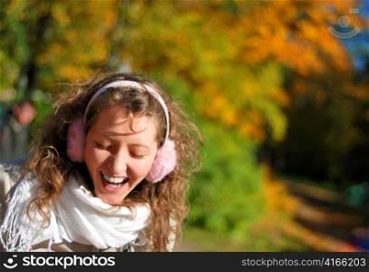 young fresh smiling woman with headpieces in autumn