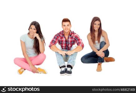 Young friends sitting on the floor isolated on white