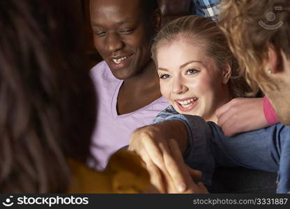 Young friends sitting together