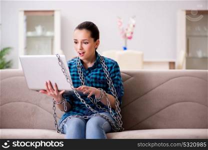Young girl addicted to laptop computer and internet