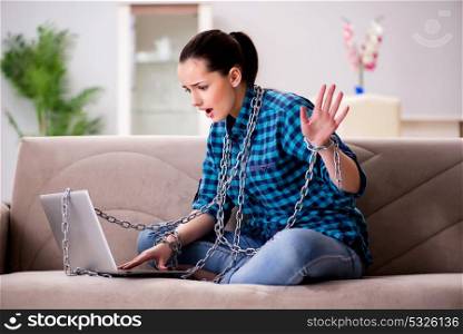 Young girl addicted to laptop computer and internet