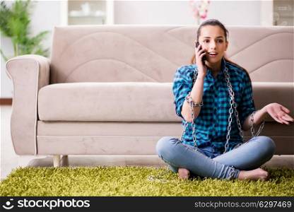 Young girl addicted to mobile phone