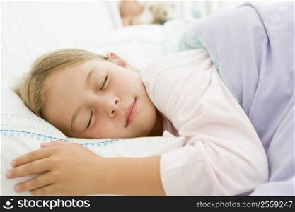 Young Girl Asleep In Her Bed