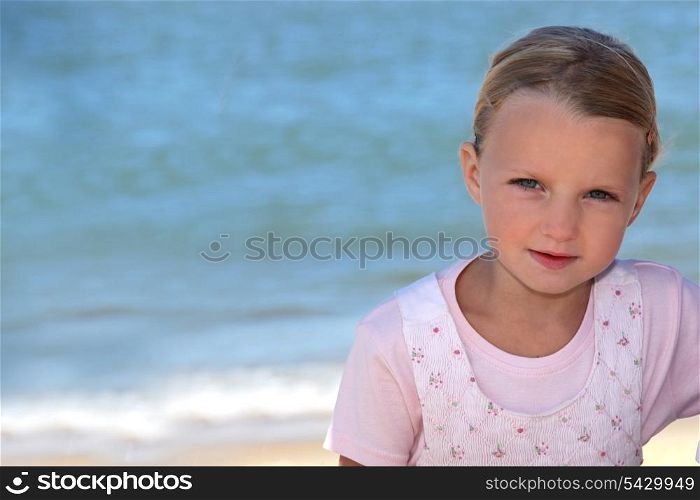 Young girl by the sea