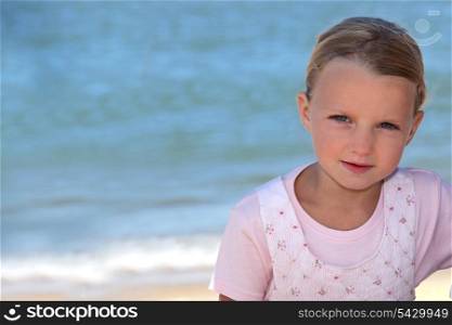 Young girl by the sea
