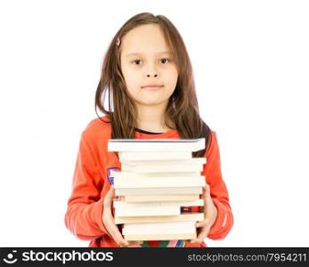 Young girl carrying a pile of books