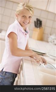 Young Girl Cleaning Dishes,