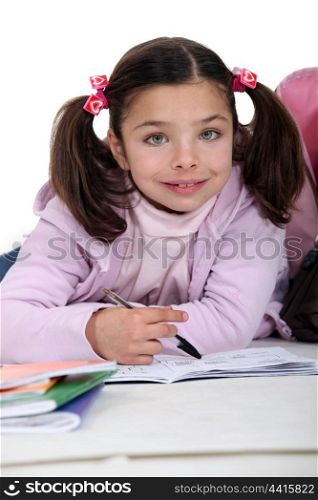 Young girl doing her homework