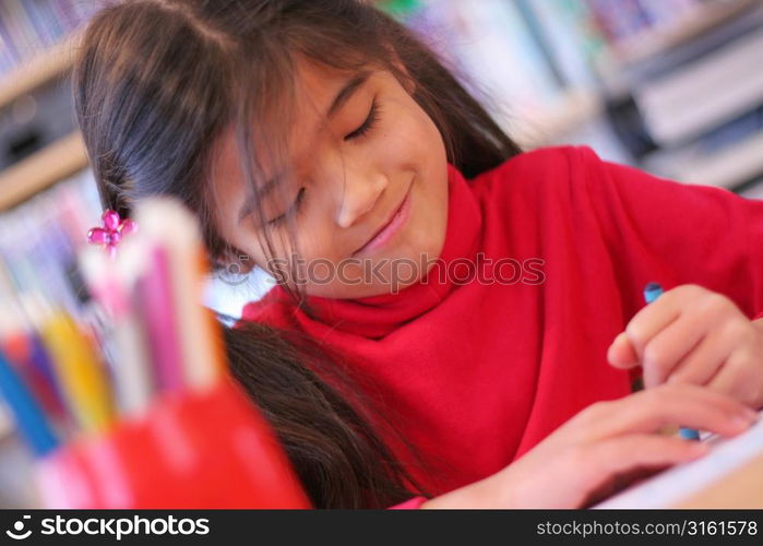 Young girl drawing