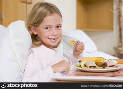 Young Girl Eating Hospital Food