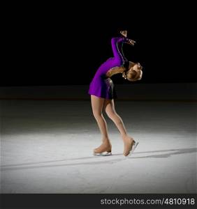 Young girl figure skater (on ice arena version)