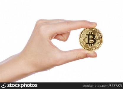 Young girl hand holding bitcoin on white background