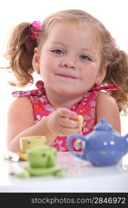 Young girl have a tea party