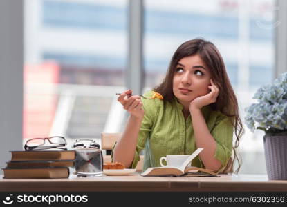 Young girl having breakfast at home